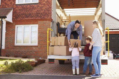 Moving boxes and furniture prepared for South Lambeth removals in a London home